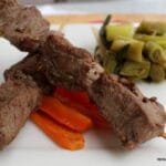 Άγριες αγκινάρες με λαχανικά και γαριδούλες. Από τη λαϊκή της Ιεράπετρας.  Wild artichokes with vegetables and little shrimps. From the food market of Ierapetra, Crete.