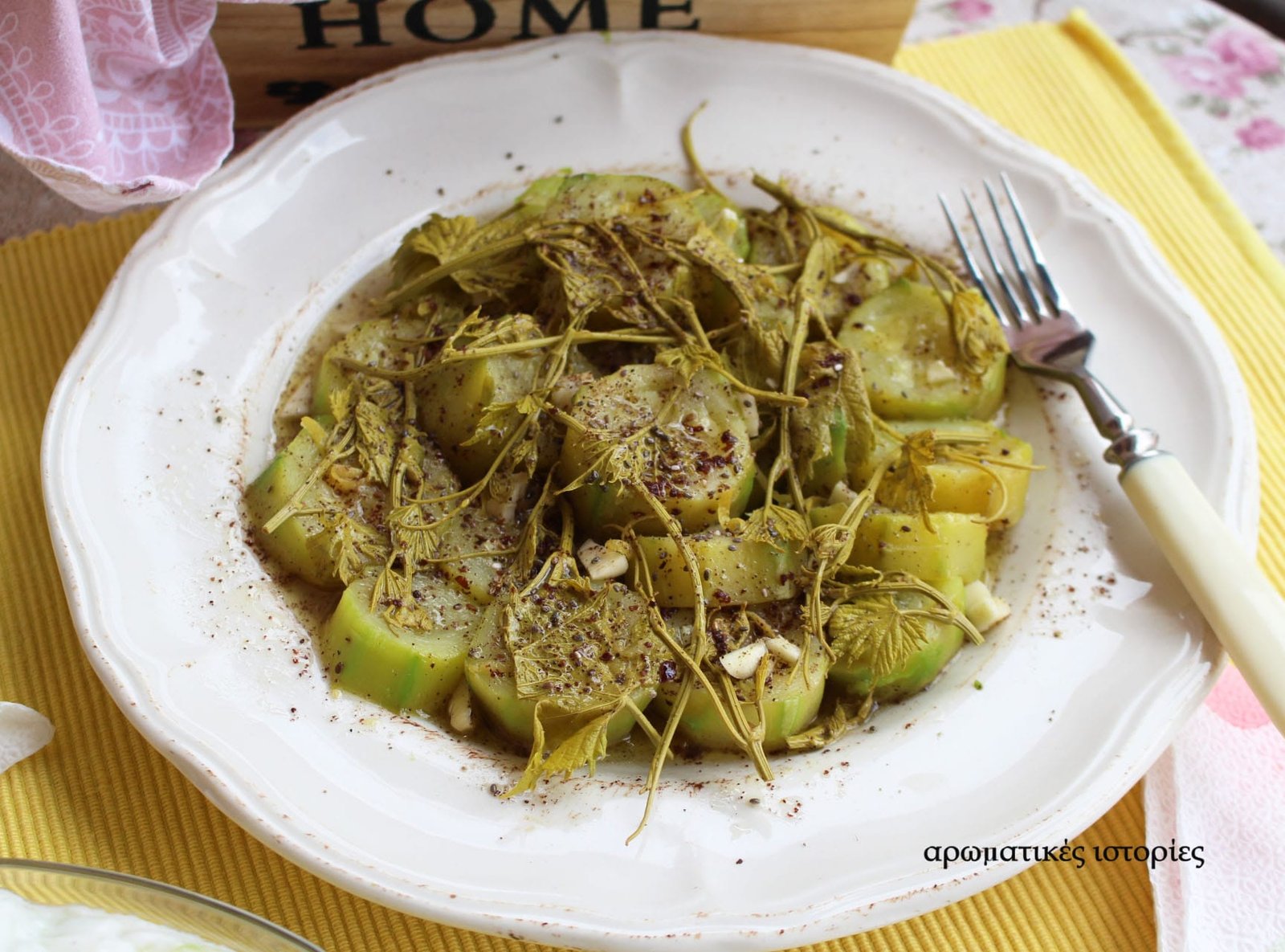 Courgette salad with early spring vinetops