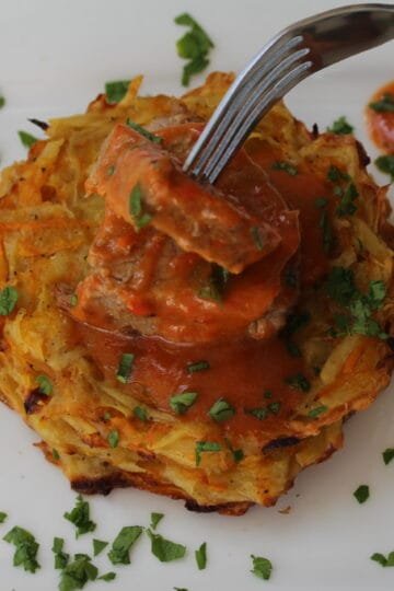 Beef stew with potato and pumpkin rosti