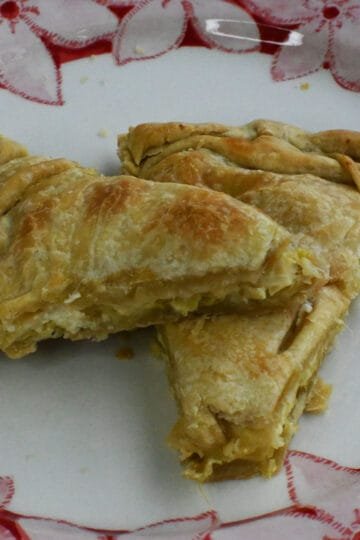 Leek pie with kefalograviera and feta cheese