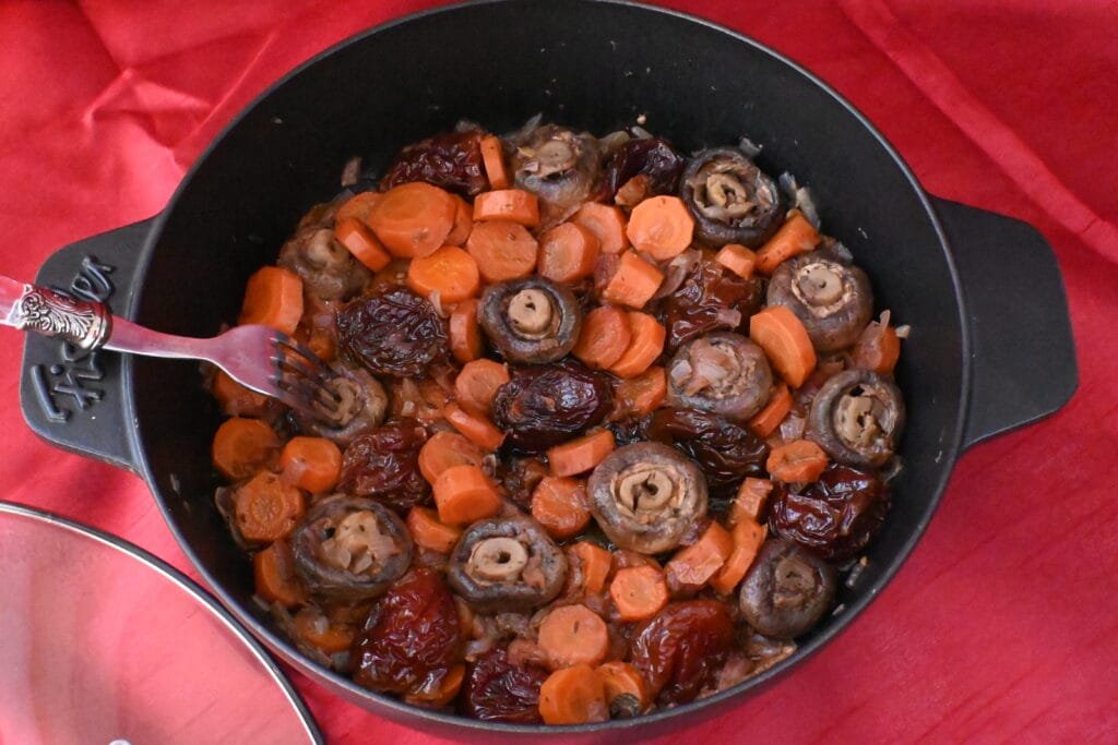 Mushroooms with wine, carrots, prunes, and dittany of Crete