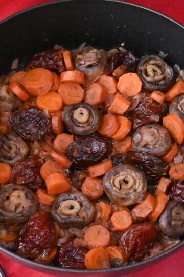 Mushroooms with wine, carrots, prunes, and dittany of Crete