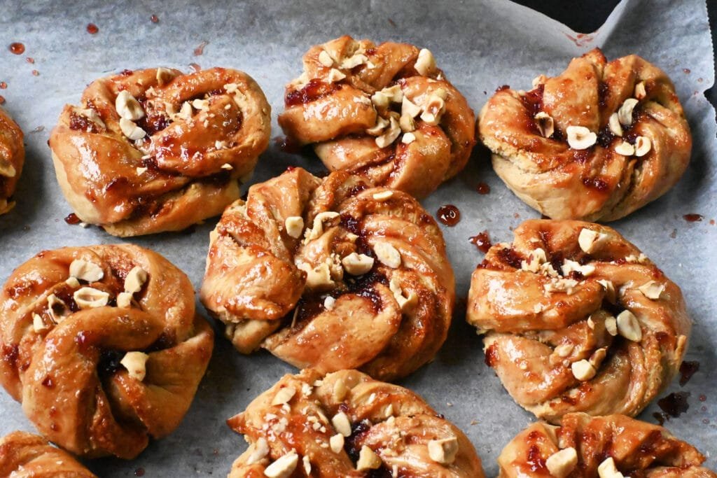 Sweet pies with marzipan and hazelnuts