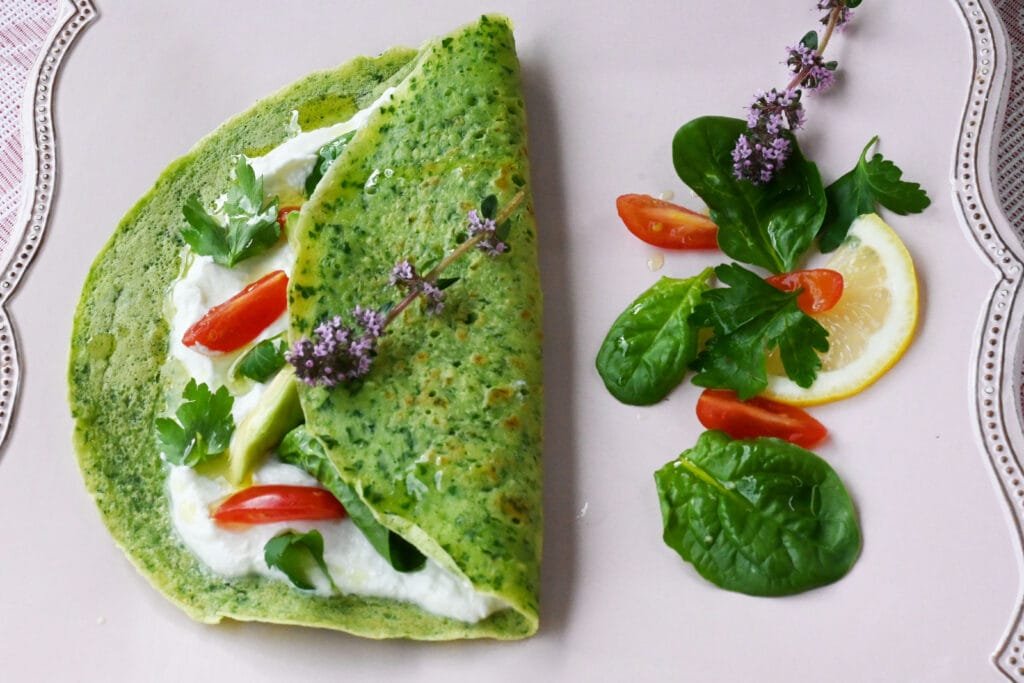 Pancakes with spinach and veggies salad with xygalo cheese from Crete