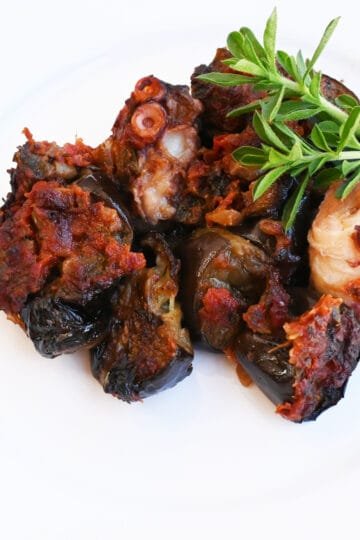 Greek octopus with eggplants in the oven