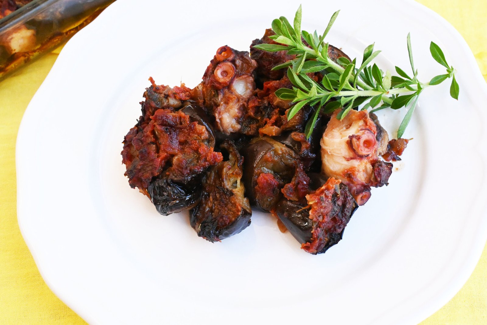 Greek octopus with eggplants in the oven