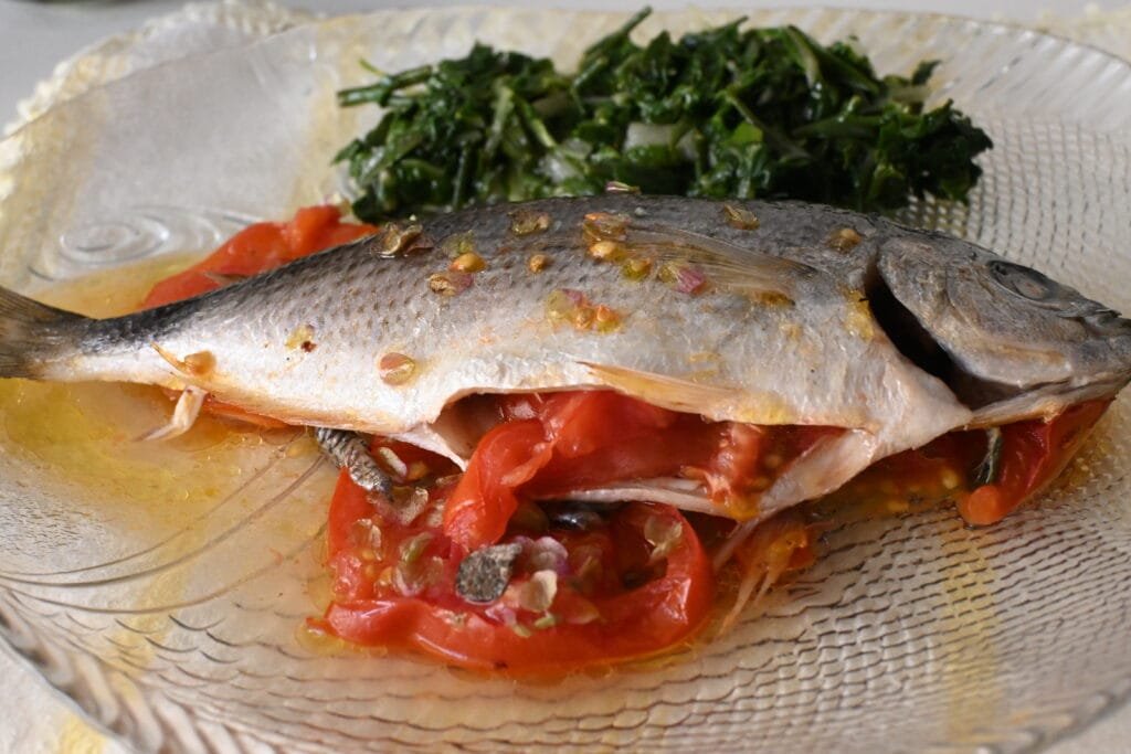 Melanouria greek fish with tomato and chard kritama salad