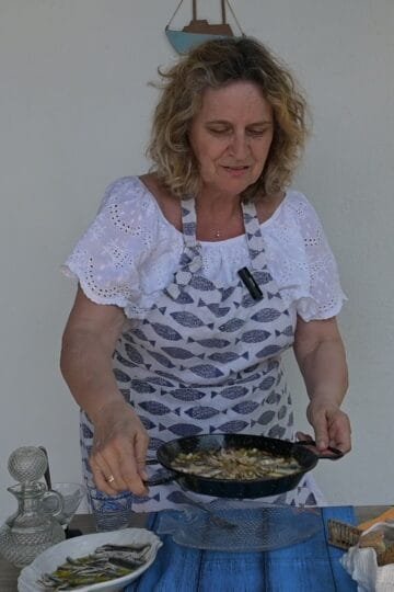 Anchovies with tomato, pepper and feta cheese
